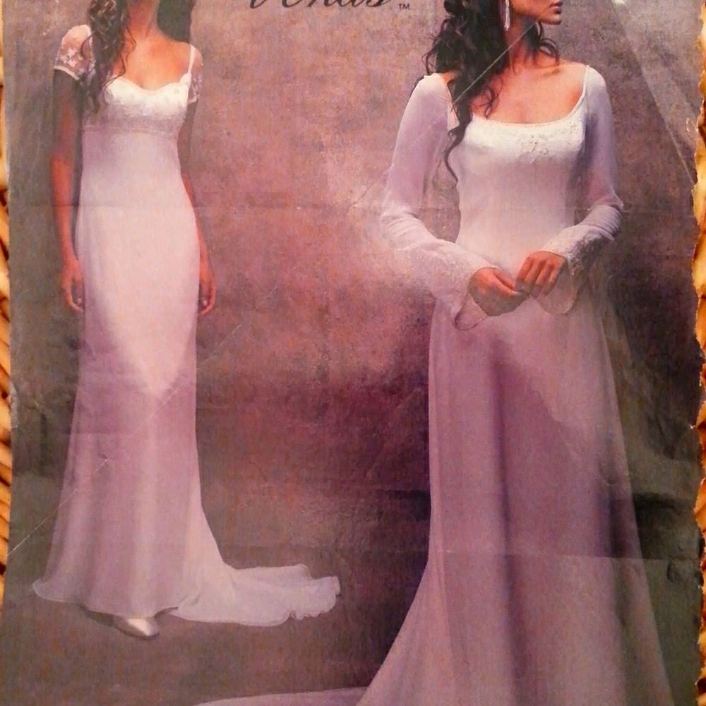 Beautiful white long sleeve wedding gown.